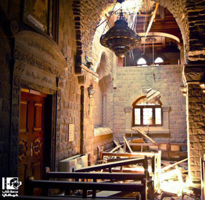 Die Kirche Umm al-Zinar in Homs wurde von mehreren Granaten getroffen. Die Kirche Umm al-Zinar in Homs wurde von mehreren Granaten getroffen.
